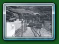 1949: The original Fairbourne terminus. Lot of detail in this picture - Basset-Lowke 4-wheel carriages, one of the Basset-Lowke glass screen/glass end carriages & at least one wooden-bodied twin-bogie carriage, from book 'Short History of Fairbourne Railway' - Bill Hyde collection