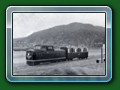 circa 1954: 'Dingo' with ex-Hardwick Manor First Class carriage at the Ferry, from book 'Short History of Fairbourne Railway' - Bill Hyde collection