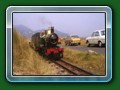1982: 'Sian' heads a packed train back towards the Passing Loop. She was put back on Fairbourne rails the "wrong way round" after her 1981 trip to Ravenglass & Romney (c) Bill Hyde