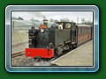 Tracy-Jo,  designed & built by G & S 1964. Originally a 2-6-2 steam-outline petrol-haudrallic. Moved to Dudley Zoo 1967. Sold 1969. At R, H & D Rly 1970. Sold to Sir William McAlpine 1974 & converted to 2-6-2DM. 1986 sold to Kirkless Light Rly & converted to 2-6-2 diesel-hydraullic. Sold to Bure Valley Rly 1991 & rebuilt as 2-6-4T steam & renamed Wroxham Broad. Bill Hyde collection (copyright owner unknown)